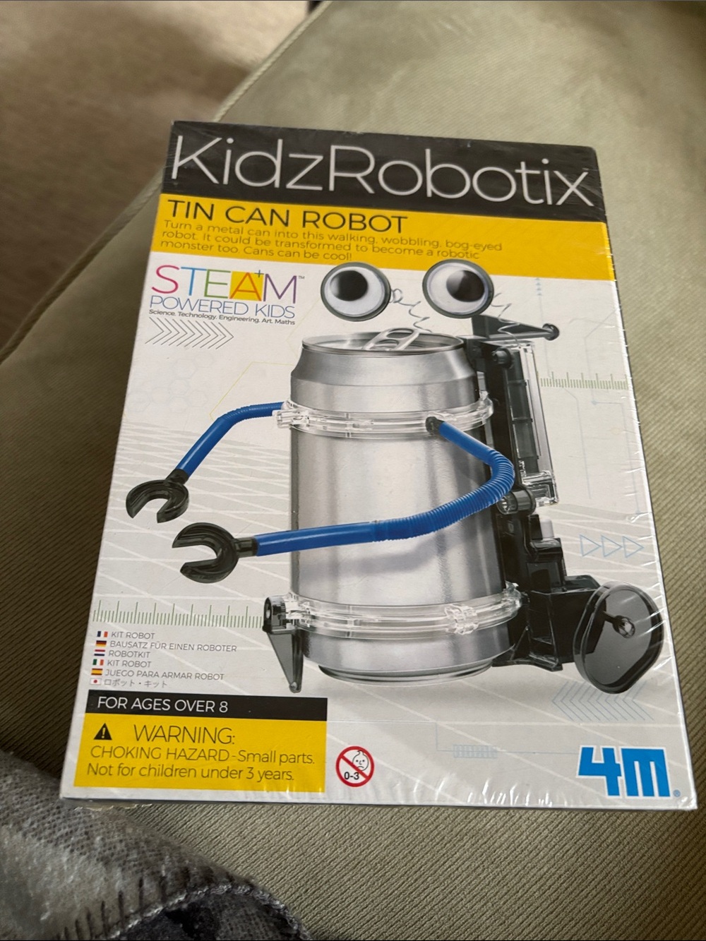 KidzRobotix Tin Can Robot Building Kit with Blue Arms for Children over 8.